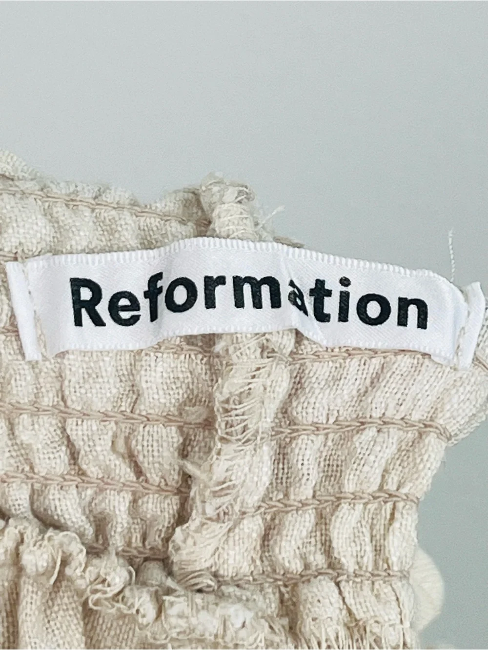 Reformation Mora 100% linen natural color smocked waist pull on pants, small.